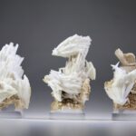 Scoleciet kristallen op zalmkleurige matrix